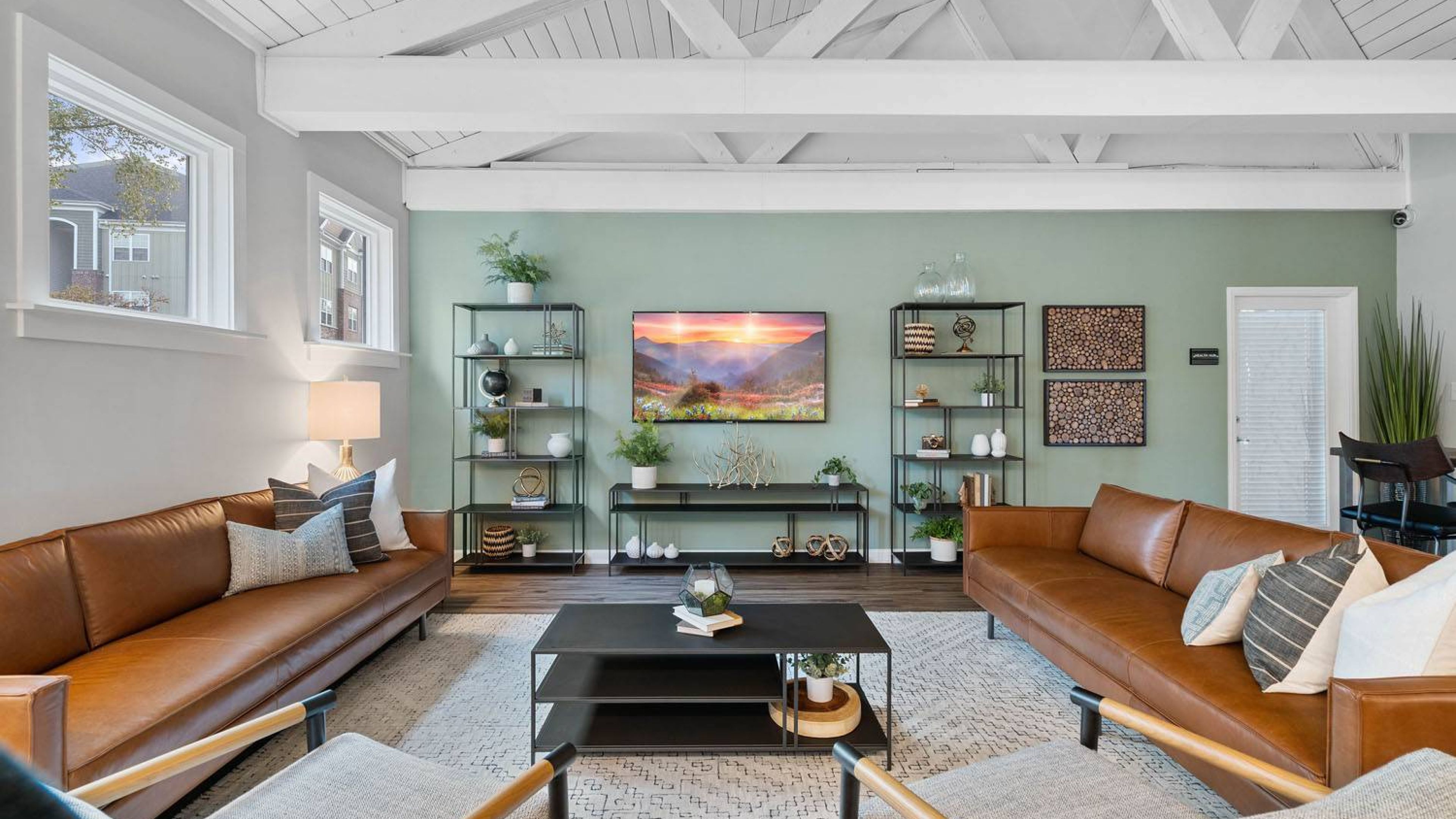 Hawthorne at Southside  offers a cozy lounge room with a comfortable couch, a stylish coffee table, and a sleek television